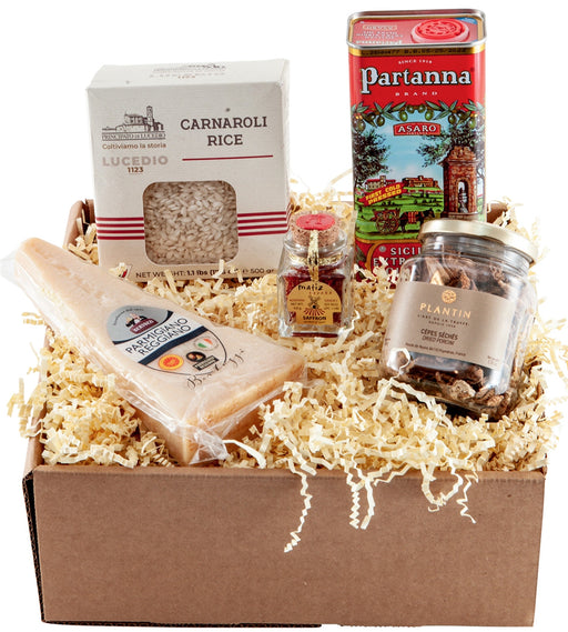The Risotto Box includes: Dried French Porcini Mushrooms, Carnaroli Rice, Partana Extra-Virgin Olive Oil, Matiz Saffron, Parmigiano Reggiano Cheese Wedge, and 2 favorite recipes